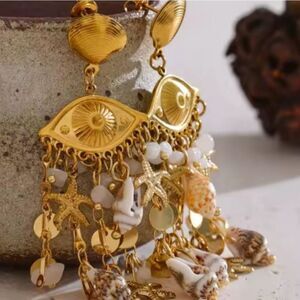 New ANTHRO Evil Eye Seashell Fringe Dangle Earrings
